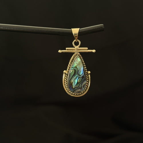 Brass teardrop statement pendant with iridescent abalone shell