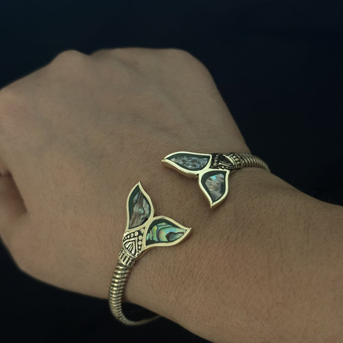 Brass open cuff bracelet with abalone shell whale tail ends