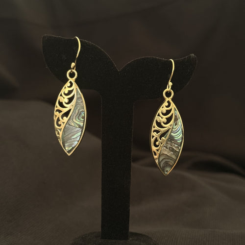 Long leaf shaped brass earrings split between filigree and abalone shell