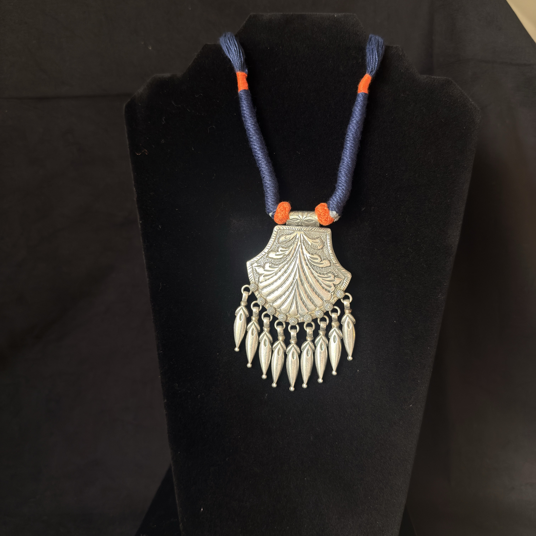 Shell shield oxidized brass fringe necklace with dark blue thread