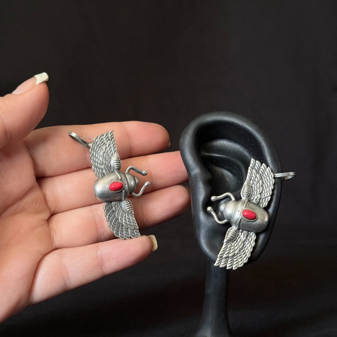 Oxidized brass bee earrings with red stone accents
