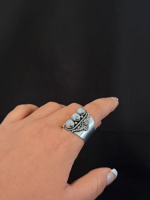 Iridescent trio shield ring