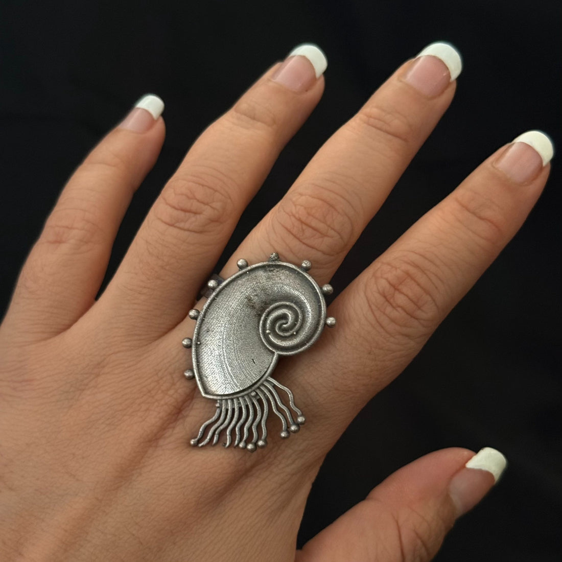 Spiral shell statement ring