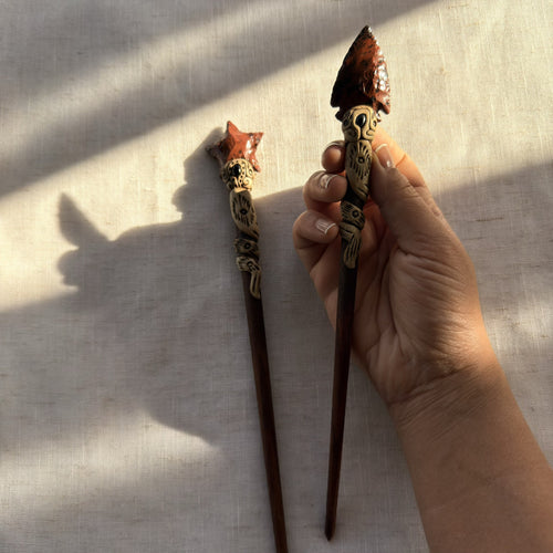 Orange glass arrow wooden hair stick