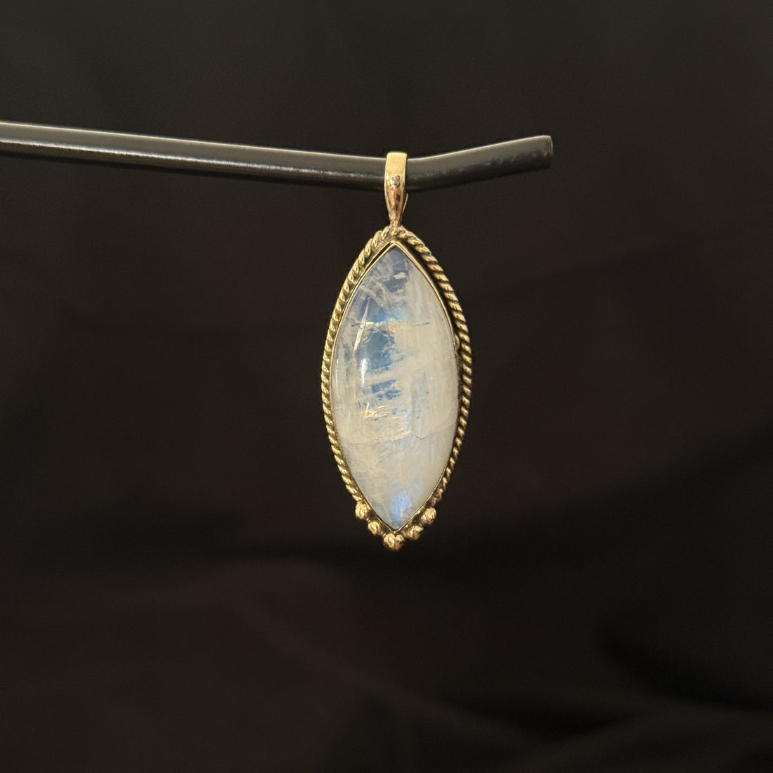 Brass marquise statement pendant with pale moonstone