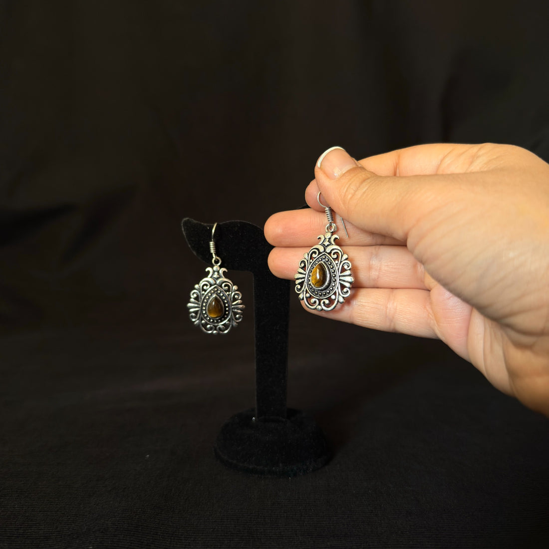 Oxidized brass teardrop earrings with tiger eye stones