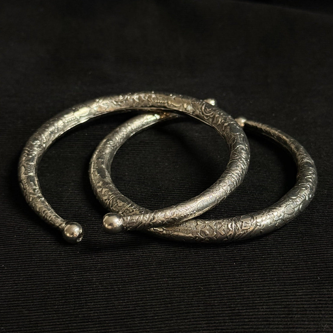 Engraved oxidized brass boot cuff pattern detail