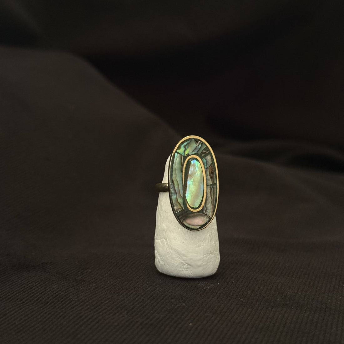 Brass oval statement ring with iridescent abalone shell