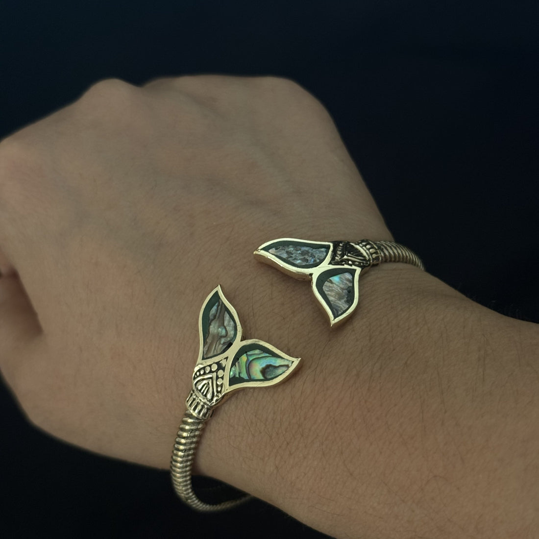 Brass open cuff bracelet with abalone shell whale tail ends