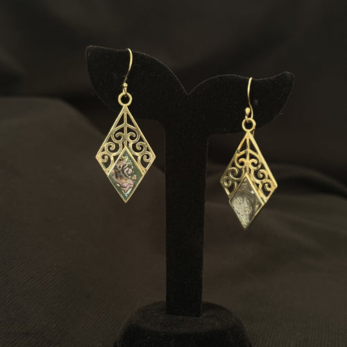 Diamond shaped brass earrings with scrollwork and abalone shell