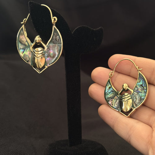 Brass hoop earrings with dancing fairy figure and abalone shell wings