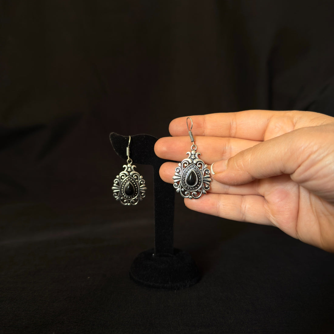 Oxidized brass teardrop earrings with black stones