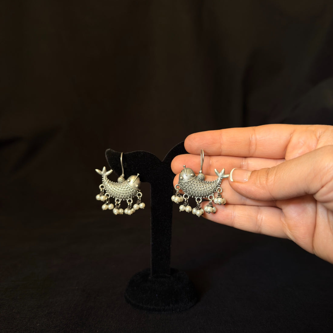 Oxidized brass fish earrings with pearl fringe