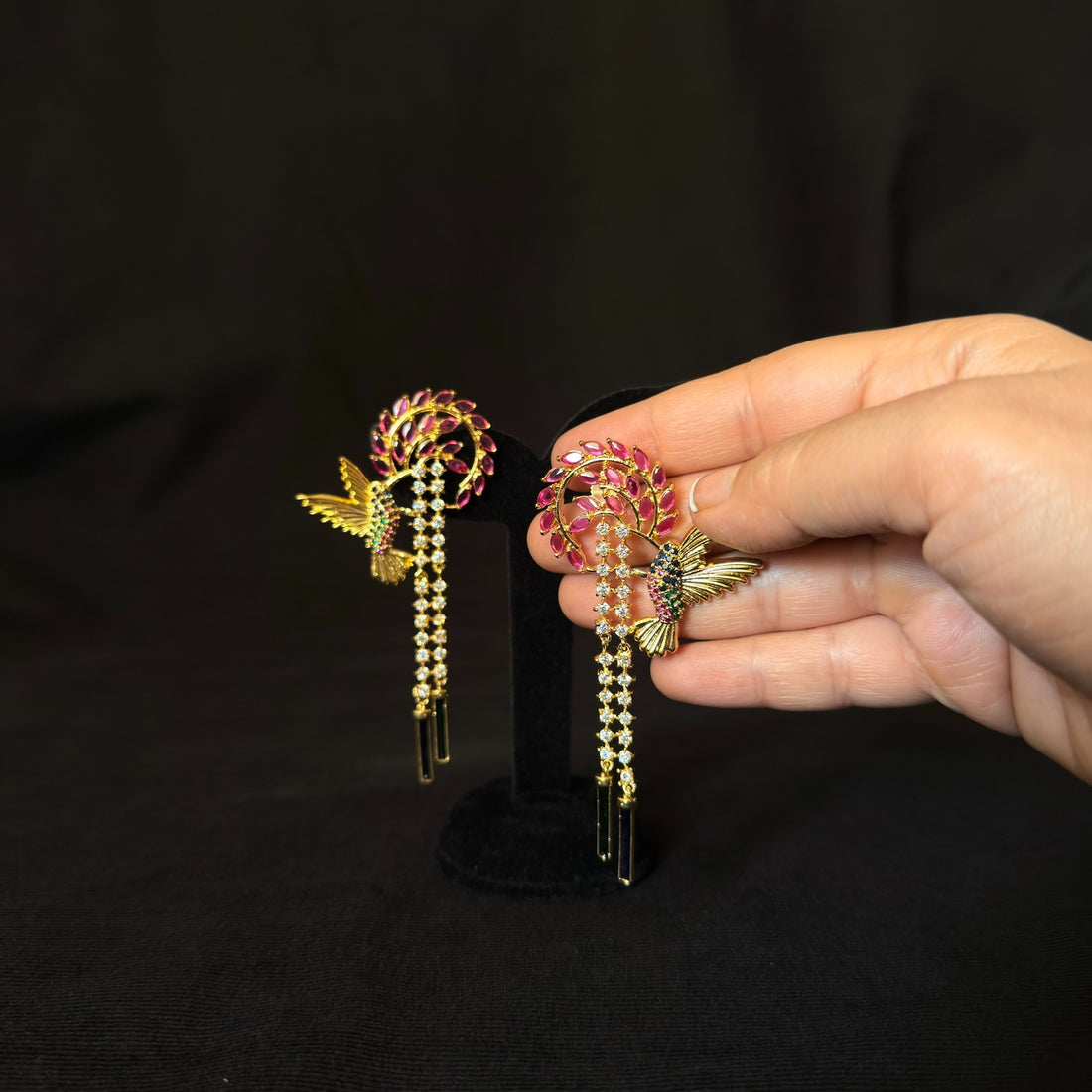 Gold-tone hummingbird cascade earrings with pink and clear stones