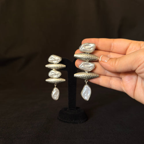Sculptural oxidized brass earrings with irregular pearl drops