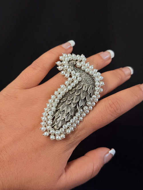 Pearl framed feather statement ring